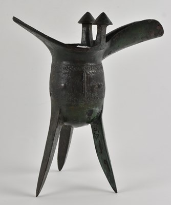 Lot 1011 - A Chinese Shang dynasty ‘jue’ tripod wine...