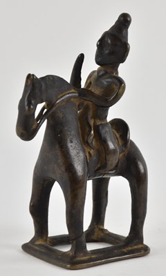 Lot 1082 - A Chinese bronze figure of Khandoba on...