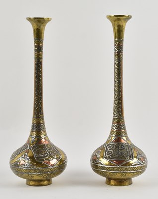 Lot 1066 - A pair of Middle Eastern Islamic mixed metal...