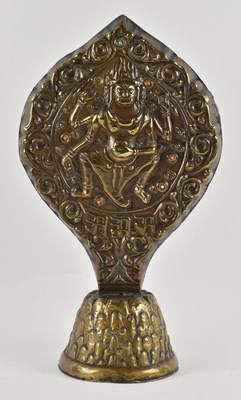 Lot 1031 - A 19th century Tibetan gilt bronze cobra head...