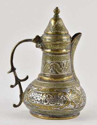 Lot 1067 - A Middle Eastern Islamic Arabic silver and...