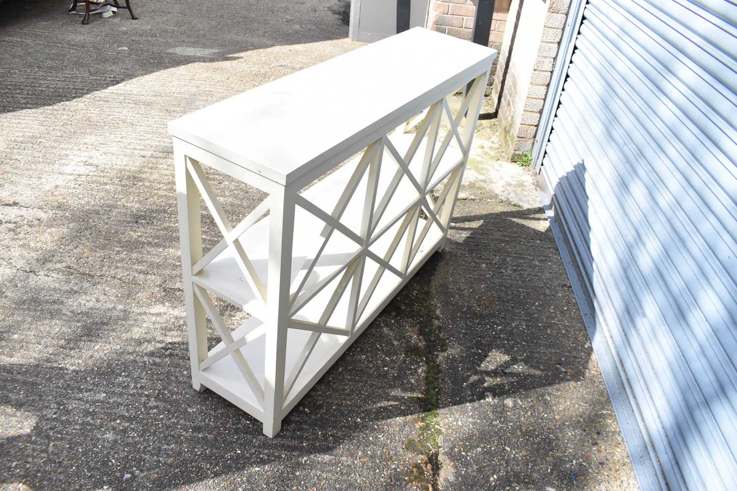 Lot 83 A set of modern white painted shelves, height