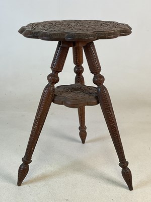 Lot 913 - An Anglo Indian carved hardwood two tiered...
