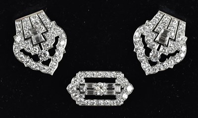 Lot 2000 - An exquisite Art Deco white metal three piece...