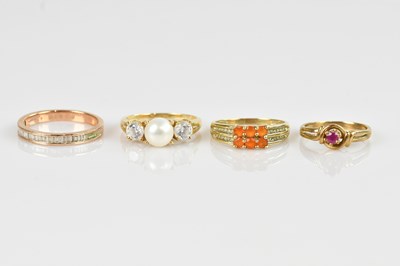 Lot 2516 - Four 9ct yellow gold dress rings, including an...