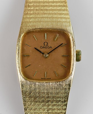 Lot 481 - OMEGA; a lady's 9ct gold wristwatch, the dial...
