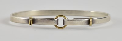 Lot 1461 - TIFFANY & CO; a 925 silver and 18ct yellow...