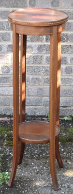 Lot 34 - An Edwardian mahogany two tier jardiniere...