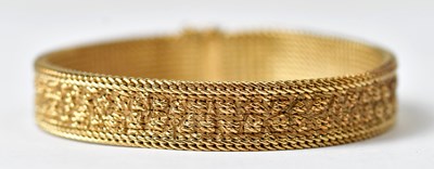 Lot 1204 - A 9ct gold tight link bracelet, width 1cm,...