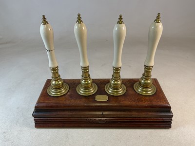 Lot 18 - A pub's beer pumps system, consisting of four...