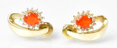 Lot 1301 - A pair of 14ct yellow gold stud earrings set...