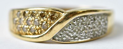 Lot 1164 - A 9ct yellow gold ring set with tiny diamonds...