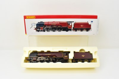 Lot 374 - HORNBY; a boxed OO gauge locomotive and tender,...