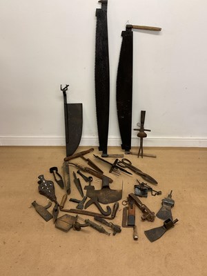 Lot 318 - A collection of early tools, to include saws,...