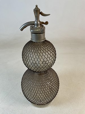 Lot 66 - A double globed siphon, with a lion crest and...