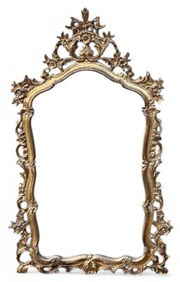 Lot 74 - A large modern ornate gilt framed florally...