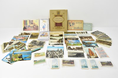 Lot 1034 - Various collectible postcards including a...