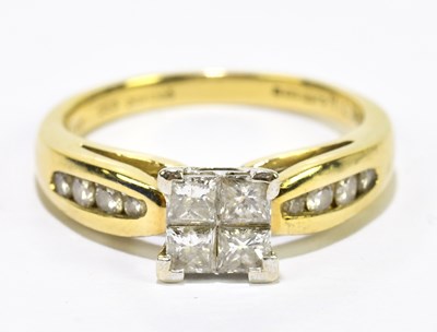 Lot 1057 - An 18ct yellow gold and diamond set ring, the...