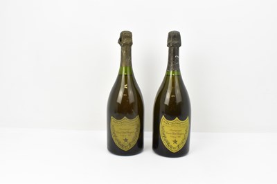 Lot 212 - Two unopened vintage bottles comprising Moët...