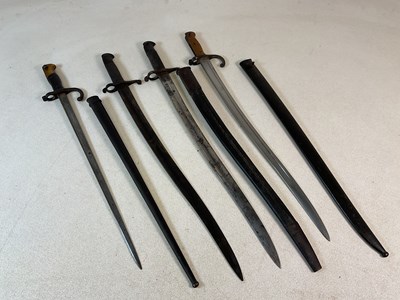 Lot 115 - Four French bayonets, comprising three...
