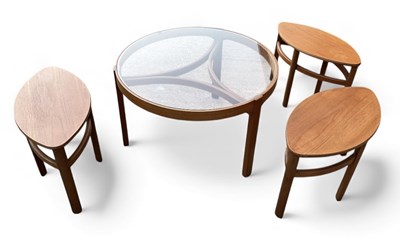 Lot 23 - NATHAN; a teak mid century circular glass...