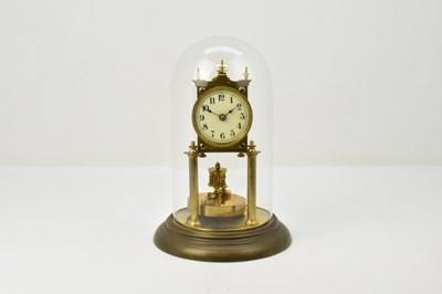 Lot 108 - A vintage German brass anniversary clock, the...