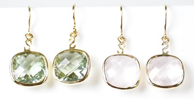 Lot 1304 - Two pairs of 10ct yellow gold earrings, one...