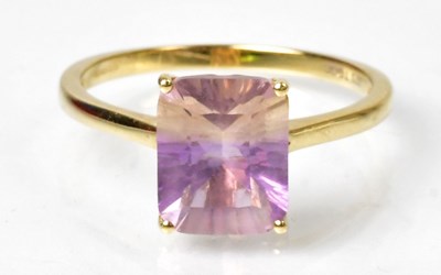 Lot 1165 - A 9ct yellow gold ametrine ring, the large...