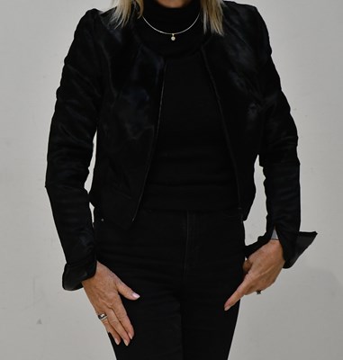Lot 263 - AMANDA WAKELEY; a short black calfskin fitted...