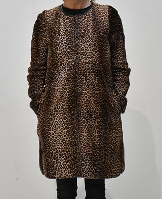 Lot 216 - GERARD DAREL; a knee length leopard printed...
