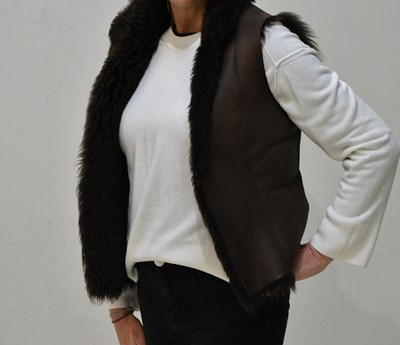 Lot 265 - JJ WILLIAMS, LONDON; a short brown shearling...