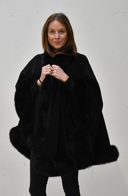 Lot 219 - MY COUTURE; a 100% black cashmere lined cloak,...