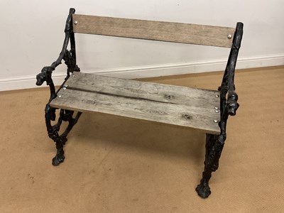 Lot 851 - COALBROOKDALE; a wrought iron garden bench...