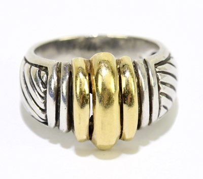Lot 1173 - A silver and 18ct yellow gold set ring, size N...