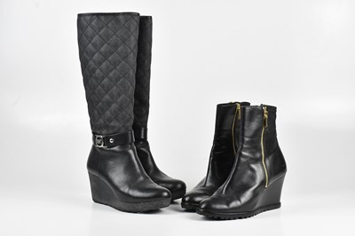 Lot 325 - MICHAEL KORS; a pair of black leather ankle...