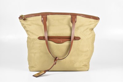 Lot 303 - RALPH LAUREN; a light beige jacquard cloth...