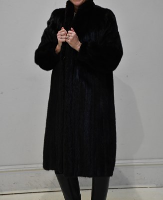 Lot 274 - MARSHALLS OF WILMSLOW; a full length brown...