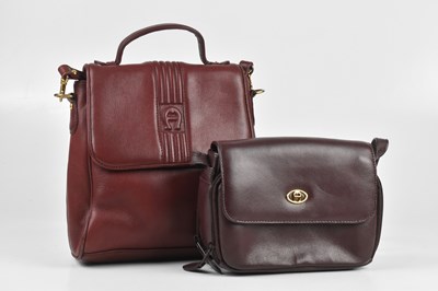 Lot 350 - ETIENNE AIGNER; two Heritage burgundy...
