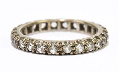 Lot 1154 - A 9ct yellow gold white stone set full...
