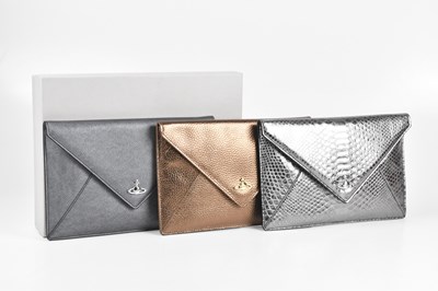 Lot 194 - VIVIENNE WESTWOOD; a silver metallic snakeskin...