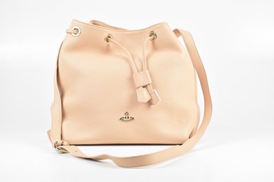 Lot 283 - VIVIENNE WESTWOOD; a light pink pebbled...