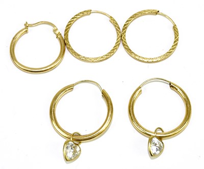 Lot 326 - Two pairs of 9ct yellow gold hoop earrings,...