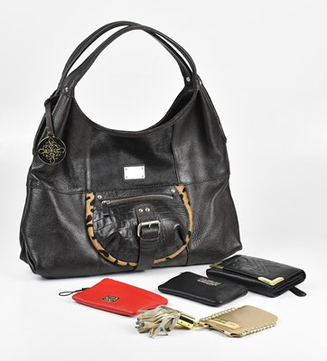 Lot 391 - PATRICK COX; a brown leather handbag, with...