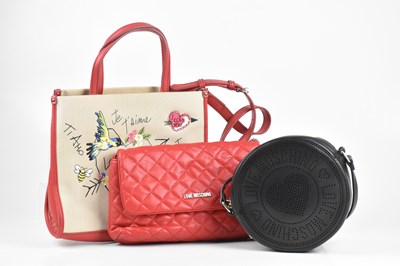 Lot 305 - MOSCHINO; a red leather and cloth Love...