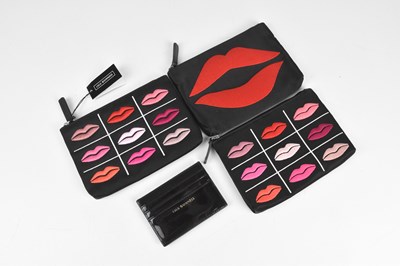 Lot 86 - LULU GUINNESS; three black cloth pouches with...