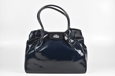 Lot 234 - LULU GUINNESS; a navy blue patent leather...