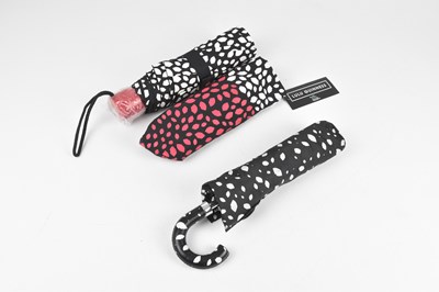 Lot 129 - LULU GUINNESS; two small umbrellas with lip...