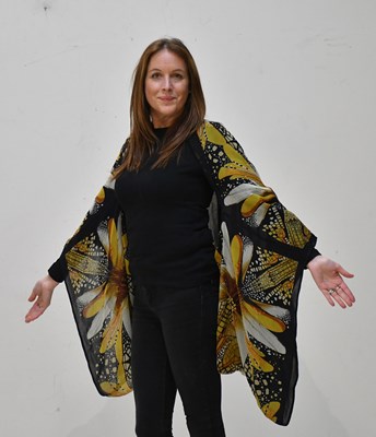 Lot 59 - ALEXANDER MCQUEEN; a 100% silk black and gold...