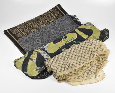 Lot 89 - BIBA; a black and tan acrylic scarf with maker'...