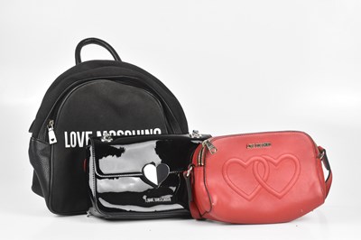 Lot 357 - MOSCHINO; a black cloth and leather 'I Love...